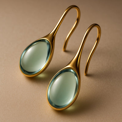 Crystal drop earrings in gold and silver